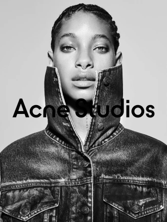 Portrait of Willow Smith wearing a high-collared denim jacket for Acne Studios Fall 2024 campaign