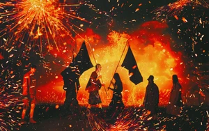 Group of models holding dark flags amidst flying fiery orange sparks and fiery background for Songzio campaign