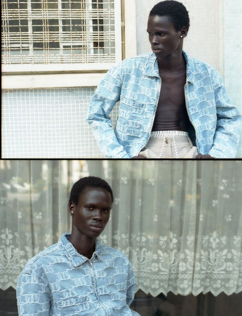 Fashion shot of a Black male wearing a light blue patterned jacket and cream pants in a diptych with two different poses outdoors.