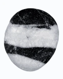 Close-up of a rounded black and white striped stone object on a solid white background.