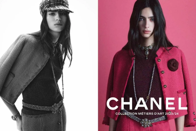 Fashion editorial shot featuring a young adult woman wearing a pink Chanel suit with vintage jewelry on a pink background.