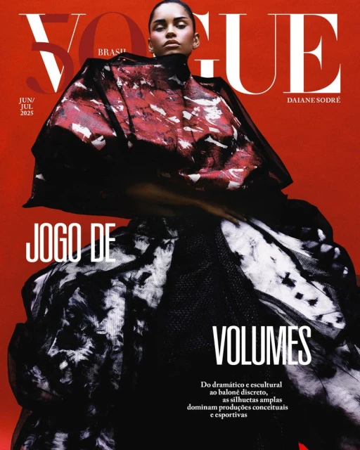 Vogue Brasil magazine cover, June/July 2025, features model Daiane Sodré in an oversized, abstract patterned black-and-red gown on a red background.