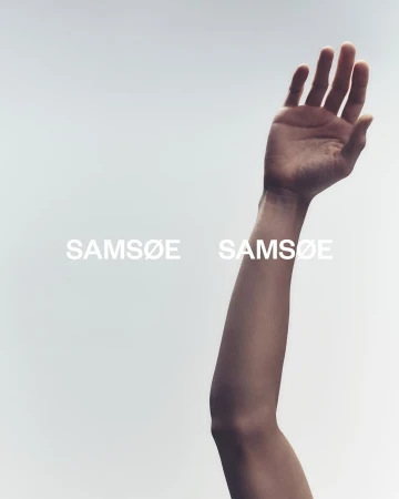 Fashion shot features a raised arm against a light background, highlighting skin tones and subtle texture. 'Samsøe Samsøe' text overlays.