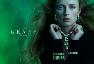 Rianne Van Rompaey wearing emerald and diamond high jewellery for Graff Galaxia campaign photographed by Mikael Jansson