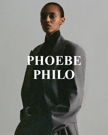 Model wearing a grey oversized blazer against a neutral background with Phoebe Philo text overlay
