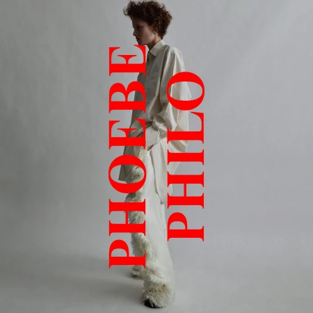 Fashion shot of a woman in white dress against a gray background with red text overlay. Minimalist aesthetic, studio lighting.