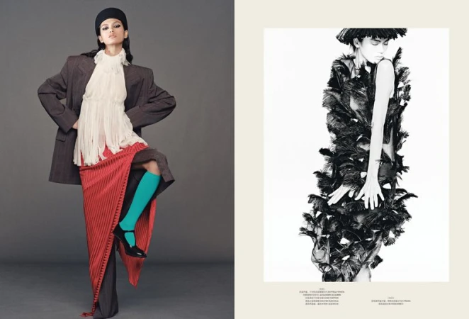Editorial fashion shot of an adult woman in a gray oversized blazer, flowing blouse, skirt, teal socks, and black hat posing in a photo studio.