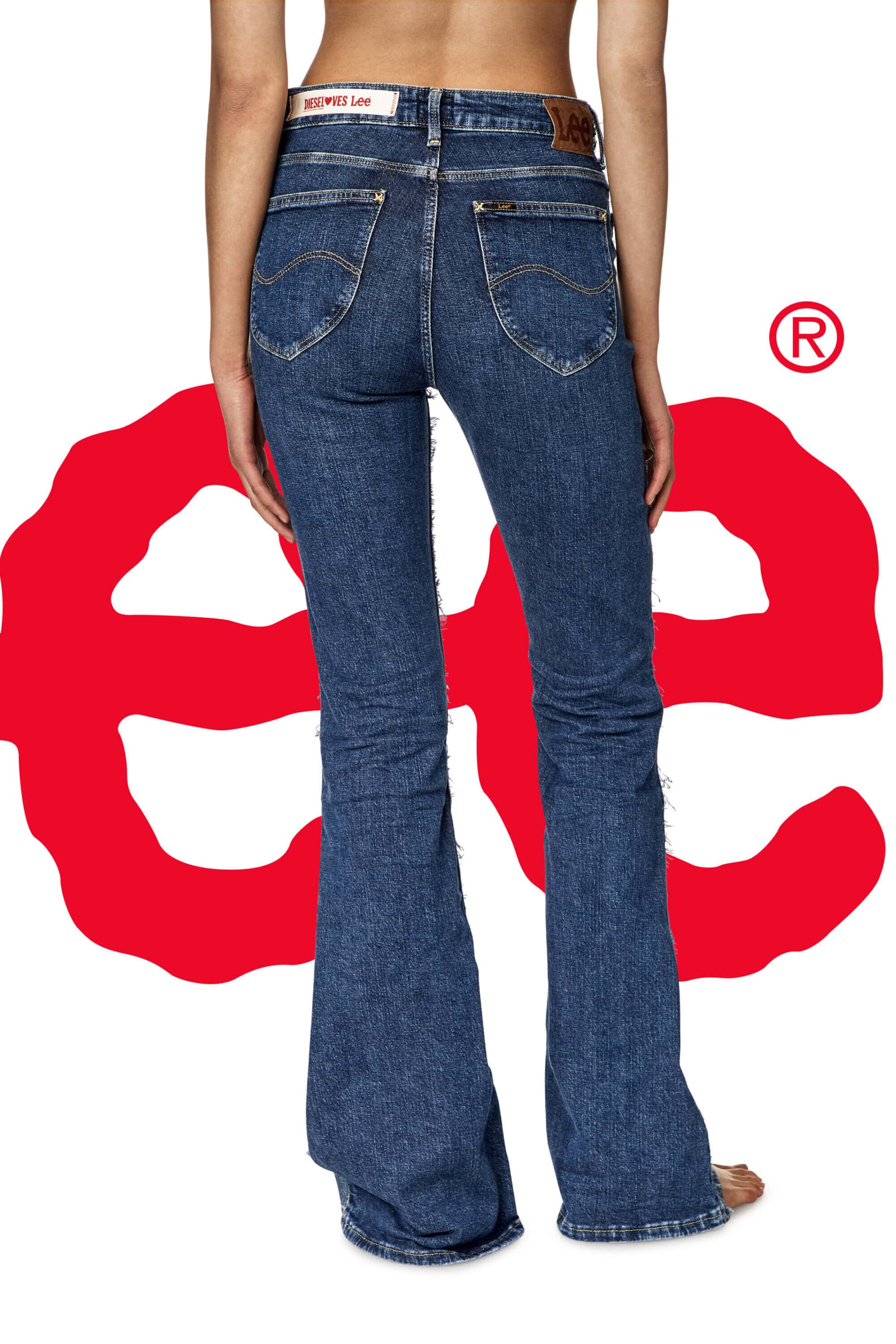 Back view of a person wearing blue denim flare jeans with a leather belt. Red graphic logo is visible on a white background.