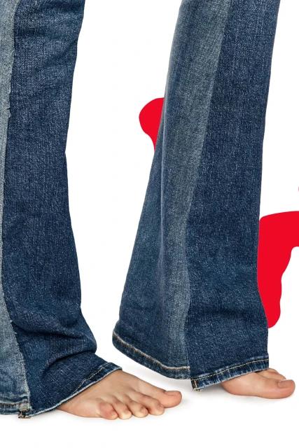 Cropped image of blue denim jeans and bare feet against a white background with a partial red shape adding a modern and casual style.