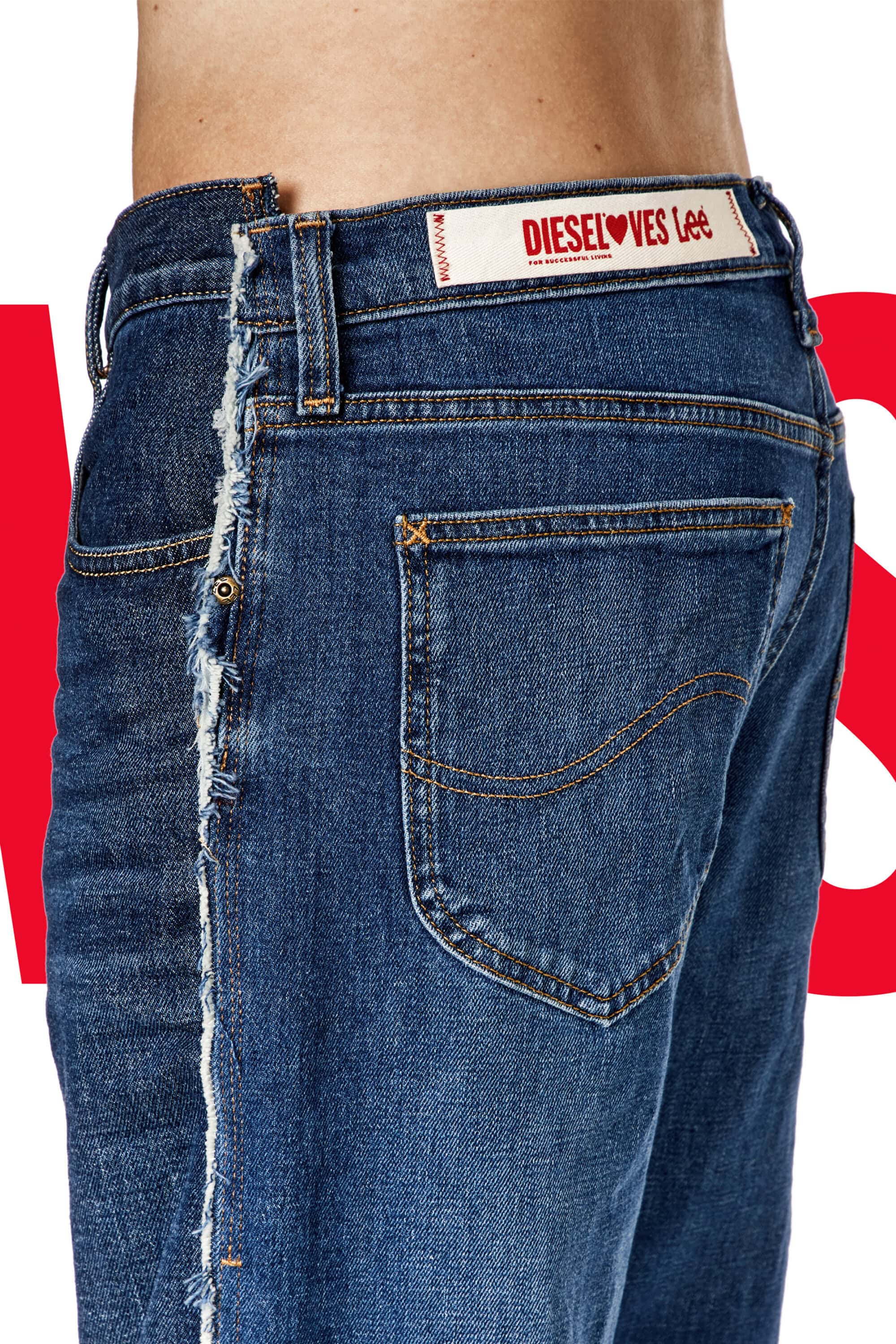 Denim jeans detail featuring a 'Diesel Loves Lee' label and fringed side seam on a white background with red accents. Fashion