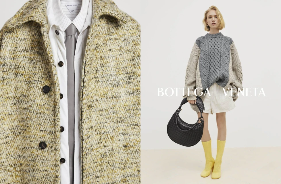 Fashion editorial featuring a model in a chunky knit sweater, shorts, boots, and a Bottega Veneta bag, alongside a patterned jacket.