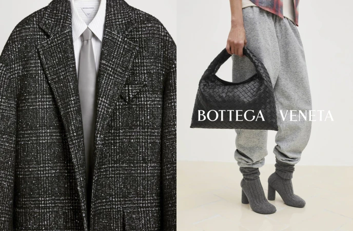 Fashion editorial featuring a black and white plaid blazer with a gray tie, a Bottega Veneta handbag, gray sweatpants, and heeled booties.