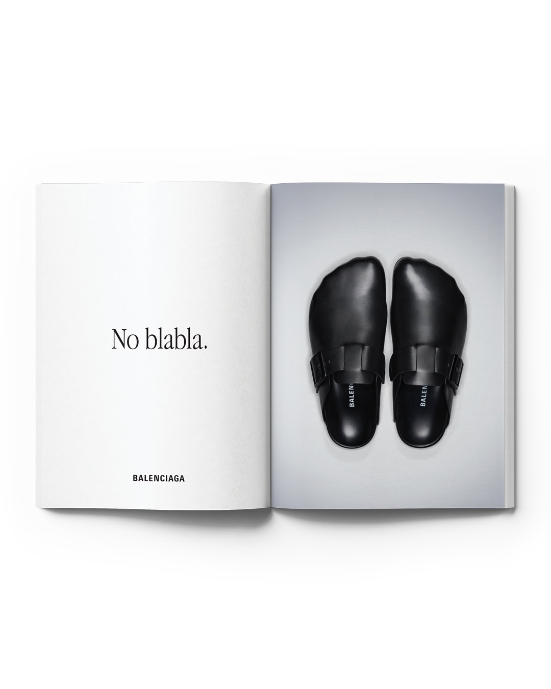 Open magazine featuring a pair of black Balenciaga clogs on a light grey background, with the text "No blabla" and the brand name.