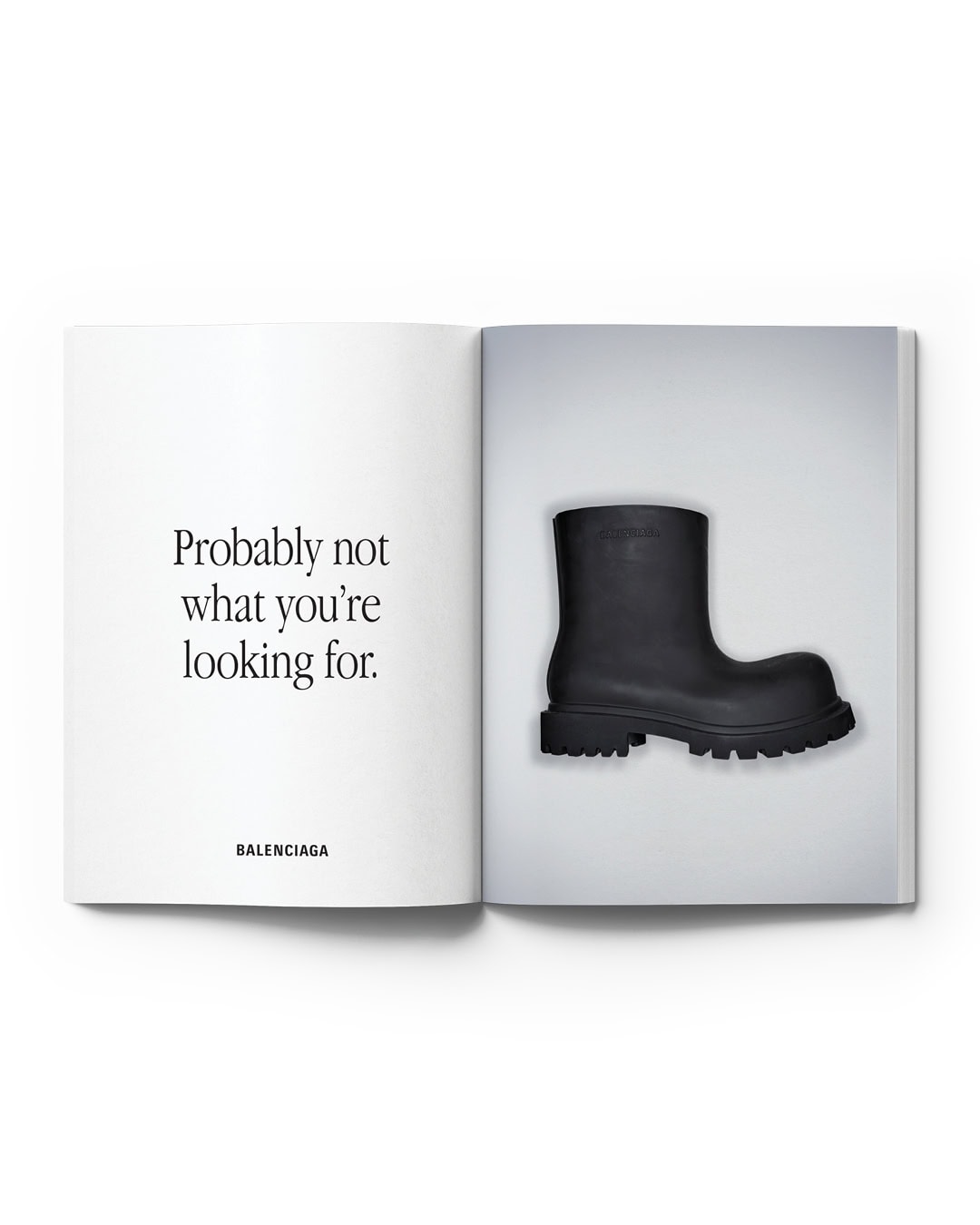 Balenciaga ad featuring a black boot. The ad displays the boot on the right page and a quote, 'Probably not what you're looking for,' on the left.