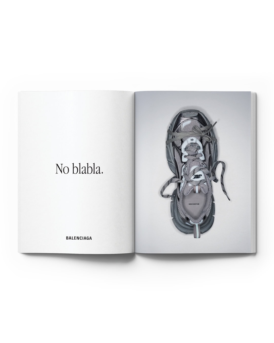 Open magazine featuring a gray Balenciaga sneaker on the right page and the text 'No blabla' and 'BALENCIAGA' on the left.