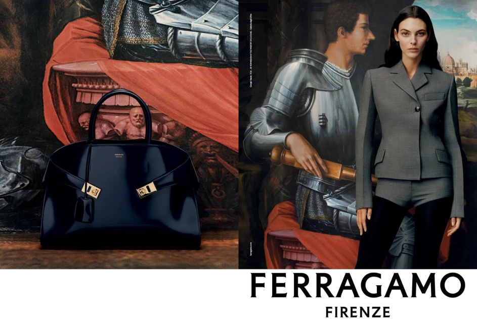 Salvatore Ferragamo ad: A woman in a grey suit stands next to a bag. The background includes painted figures and the brand name.