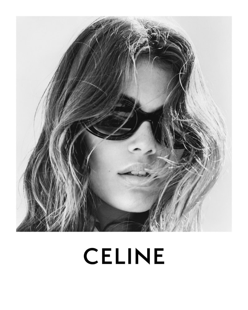 Black and white portrait of a woman with sunglasses and wavy hair. The brand name CELINE is printed below the model in the photo.