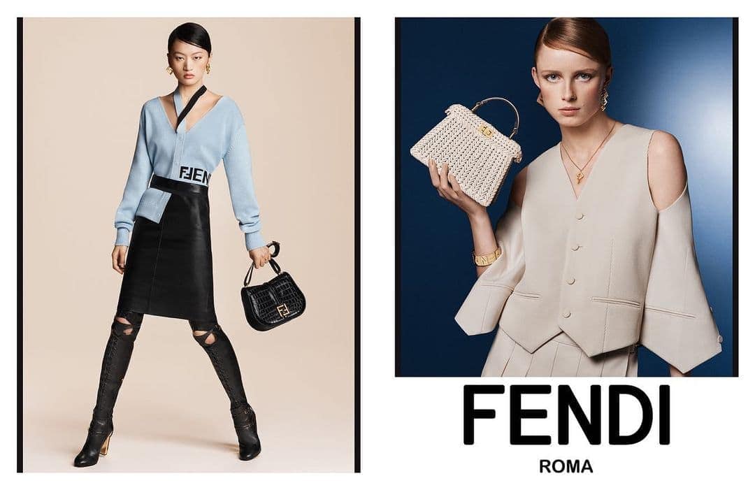Two women model Fendi designs indoors. One wears a light blue sweater, leather skirt, and thigh-high boots, accessorized with a black purse. The other is in beige.