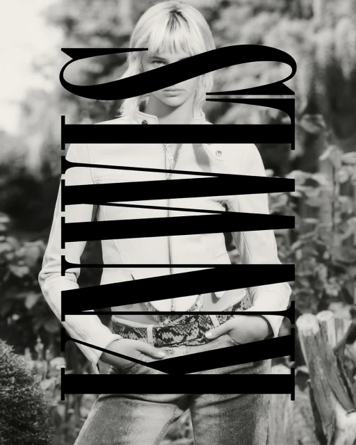 Monochrome portrait of a blonde woman wearing a light jacket and jeans outdoors, featuring prominent typography overlay.