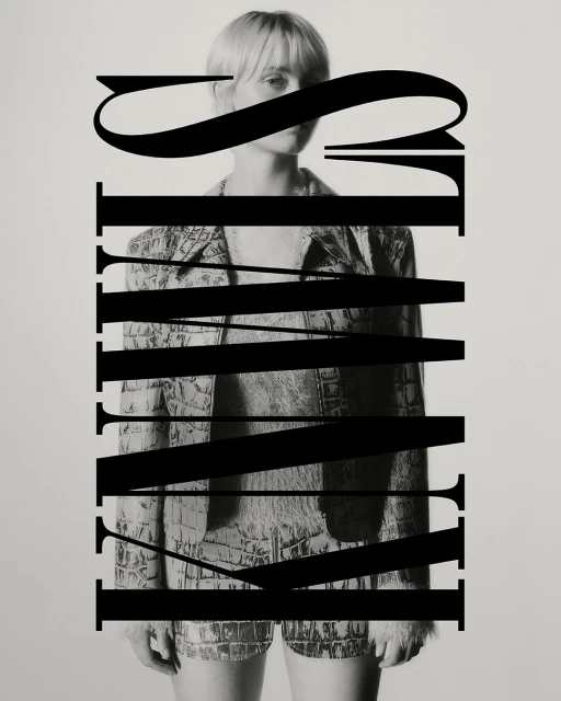 Monochrome portrait of a blonde woman in a patterned suit, partly obscured by bold typographic elements, creating a stylish editorial image.
