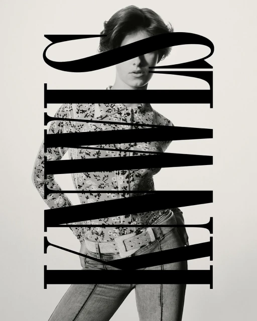 Monochrome fashion portrait of a brunette woman wearing a patterned blouse and blue jeans, featuring bold typography overlay in black.