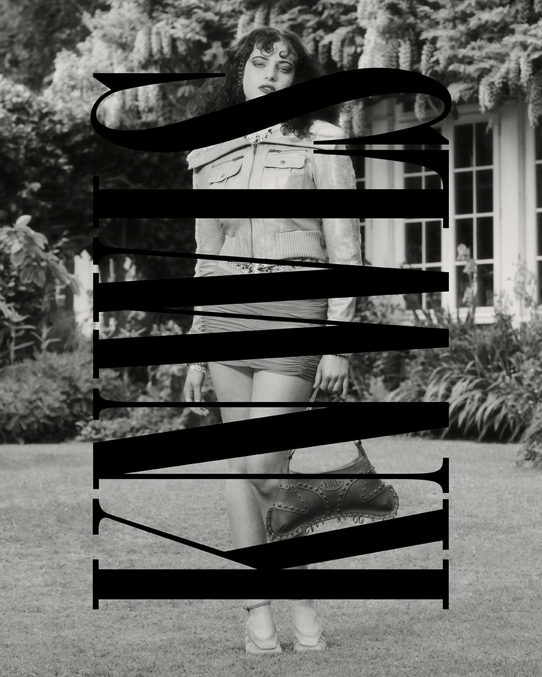 A woman in vintage style clothing is standing in front of a house with garden, the image is overlaid with large text.
