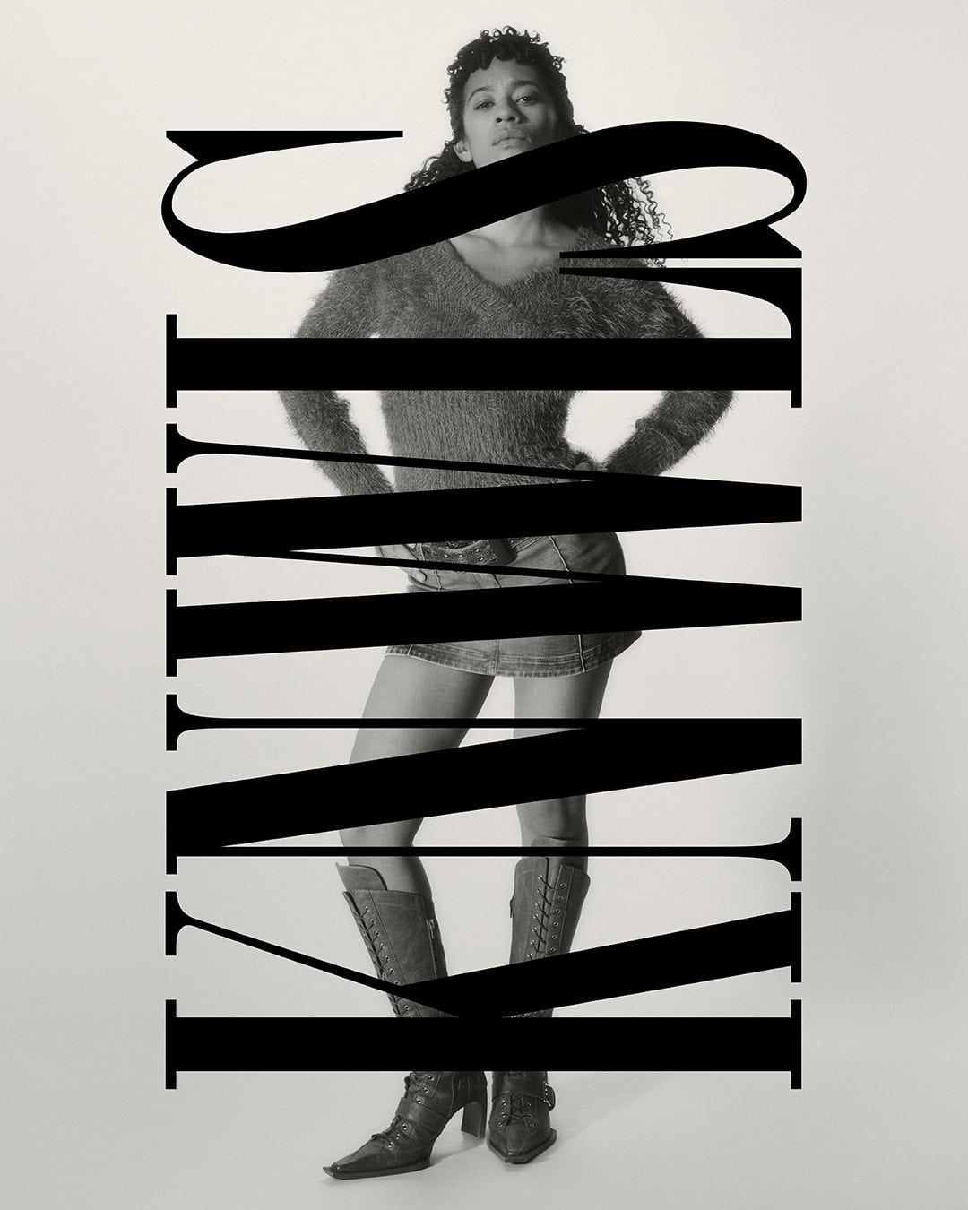 Black and white fashion photograph of a woman in a mini skirt and boots, posed against a light background and obscured by bold typography.