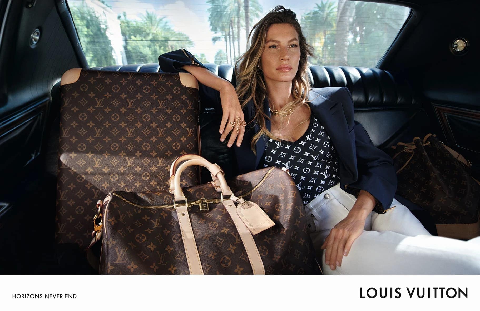 Elegant woman in a car with luggage, promoting luxury travel and fashion. Palm trees visible through the car window.