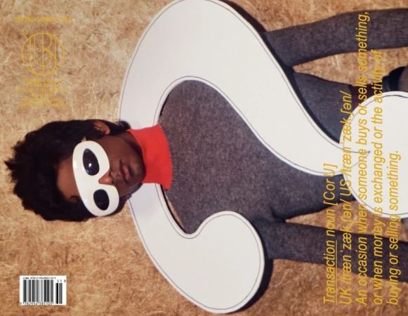 Person with large white glasses and statement collar posing against a textured background with overlaid typography and design elements.