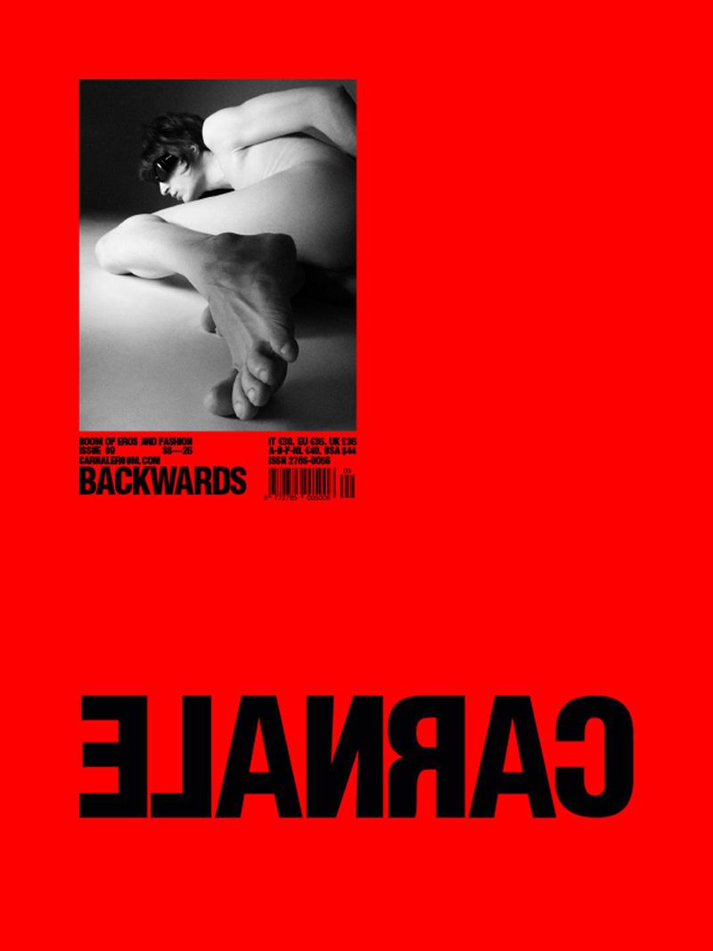 Black and white magazine cover with an image of a nude person on a red background, featuring bold typography and minimalistic design.