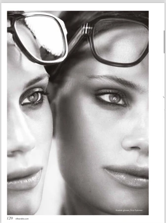 Monochrome shot of two women's faces, close-up, wearing glasses. Fashion eyewear advertisement with beauty focus on eyes and lips.