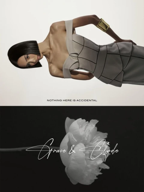 A woman with short black hair wearing an elegant white dress and gold cuff poses on a white background above a close-up flower.