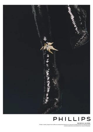 Sequin-covered garment with a floral brooch pinned on it, set against a dark background, emphasizes texture and elegance.