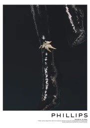Gold leaf brooch attached to a black sequined boot against a dark background for Phillips jewelry.