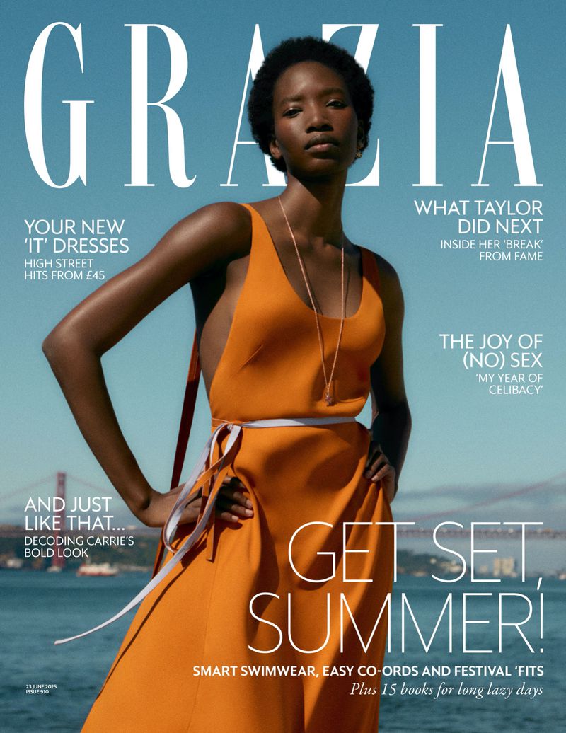 Grazia cover featuring an African American woman in an orange dress, posing against a backdrop of the Golden Gate Bridge and San Francisco.