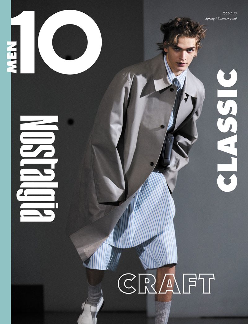 10 Men magazine cover featuring a male model in a trench coat and striped shorts, showcasing classic and craft elements.