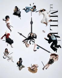 Fashion models posed as clock numerals around large black clock hands on a white studio background with vertical Le Mile text.