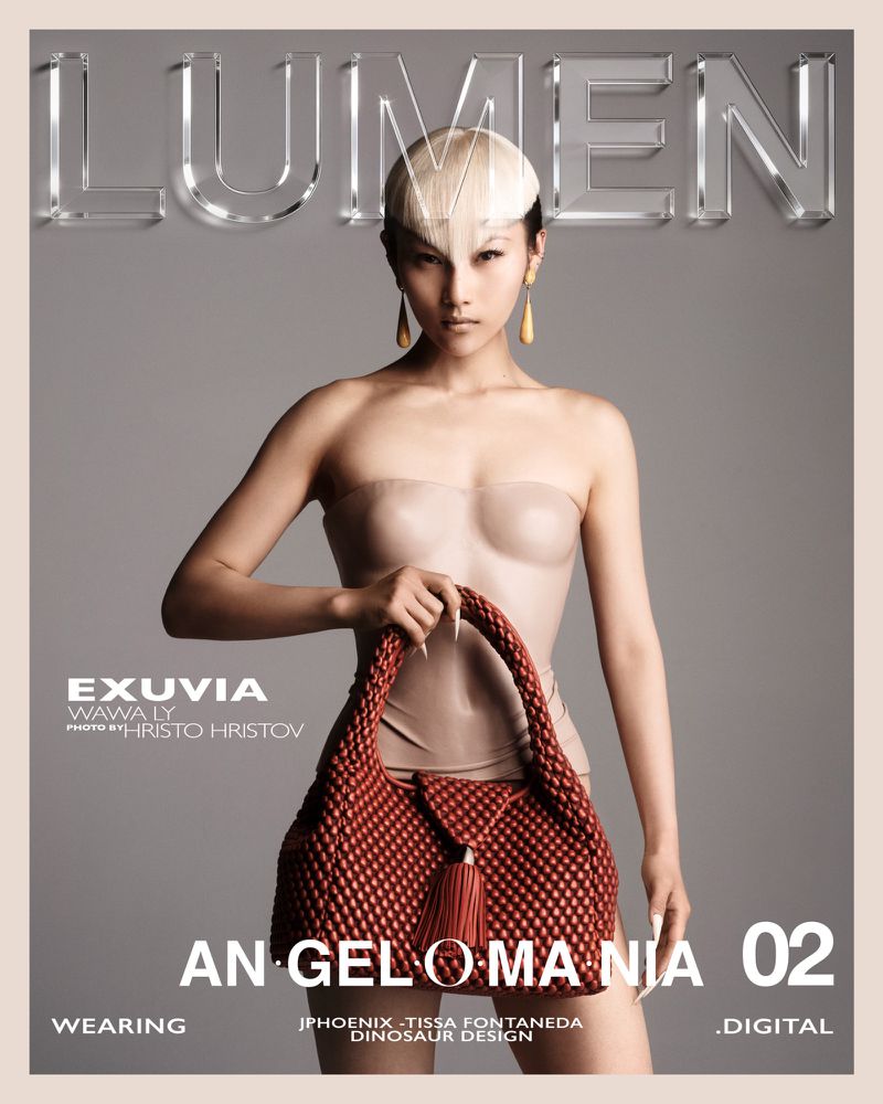 Magazine cover featuring a model with stylized hair, holding a braided handbag against a grey backdrop, with the title 'Lumen' displayed.