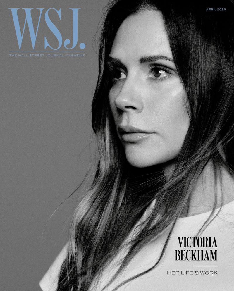 Victoria Beckham cover of WSJ. Magazine, April 2024. Portrait of a woman with long brown hair and a white t-shirt against a grey background.