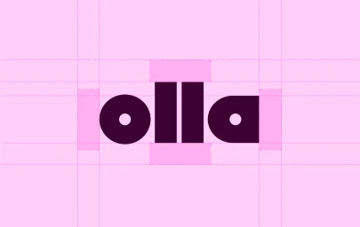Dark purple lowercase olla logotype displayed with vector construction guidelines and spacing blocks on a pink background.