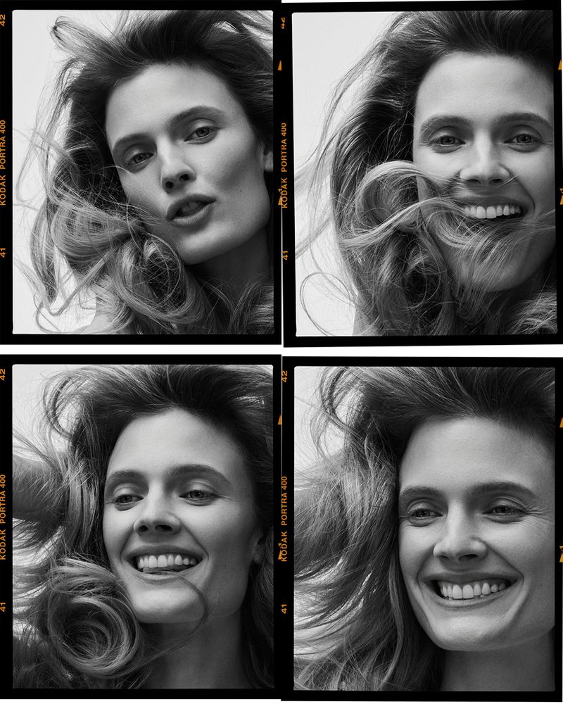 Four black and white contact sheet portraits of model Constance Jablonski smiling with voluminous windblown hair.