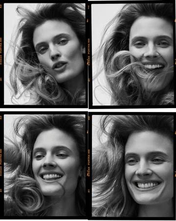 Four black and white contact sheet portraits of model Constance Jablonski smiling with voluminous windblown hair.