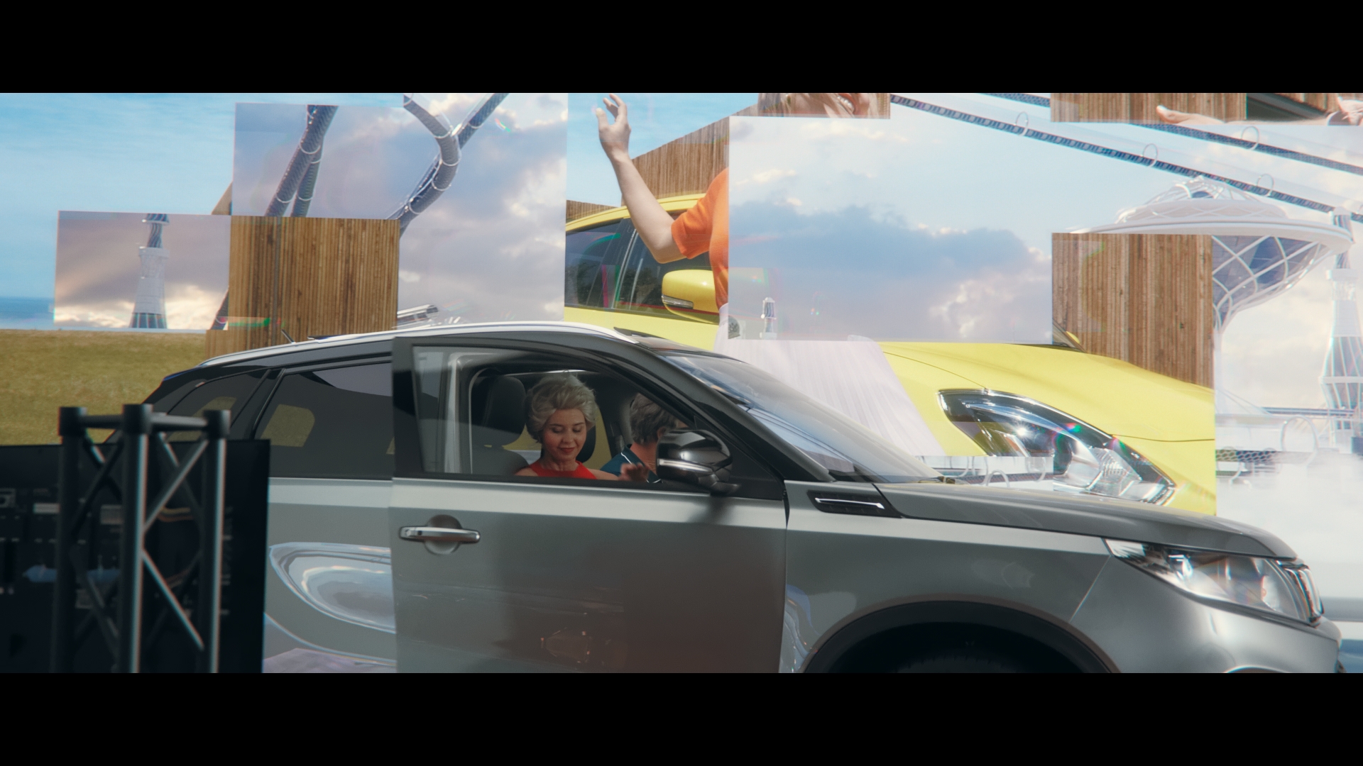 Silver SUV with occupants in a visually layered scene featuring architectural structures, blue skies, and sunny weather in a composite image.