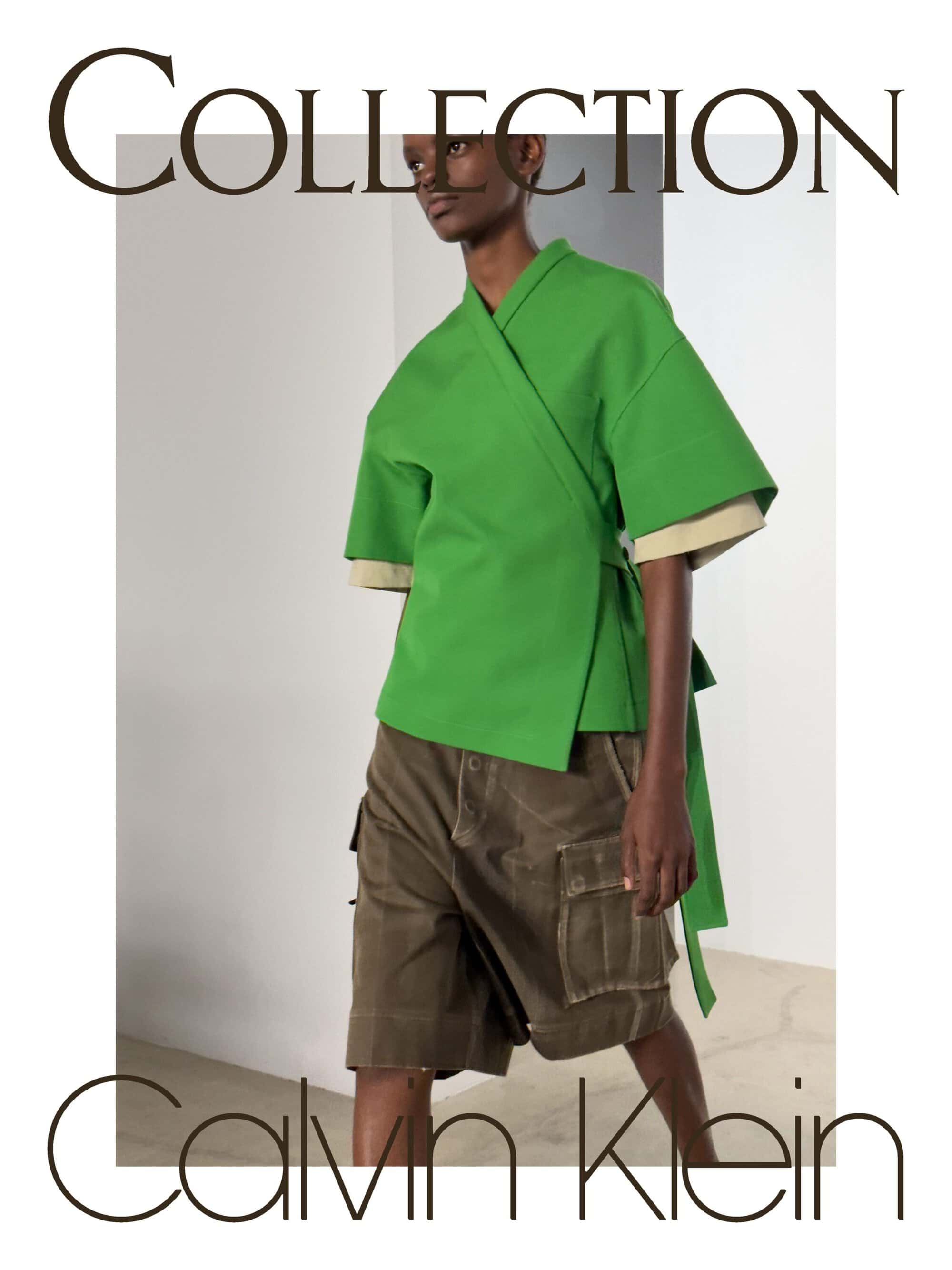 Model wearing a bright green wrap top and olive cargo shorts in a minimalist studio setting with Calvin Klein Collection typography.