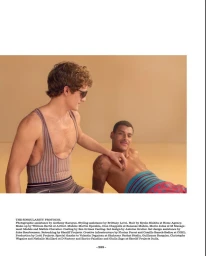 Two male models posing in vintage-style swimwear against a warm beige backdrop for Fantastic Man editorial.