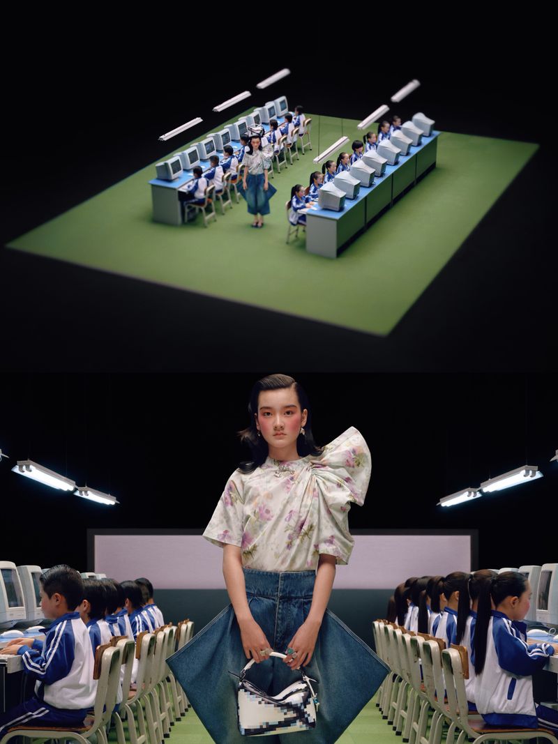 Woman poses with handbag amid rows of children at computers in a surreal setup with bright lighting and retro-style technology.