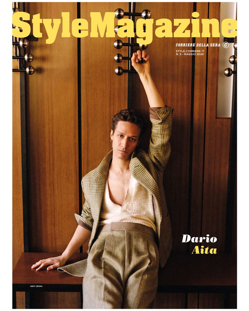 Italian actor Dario Aita wearing a tailored plaid suit and cream knit top on the cover of Style Magazine Italy.