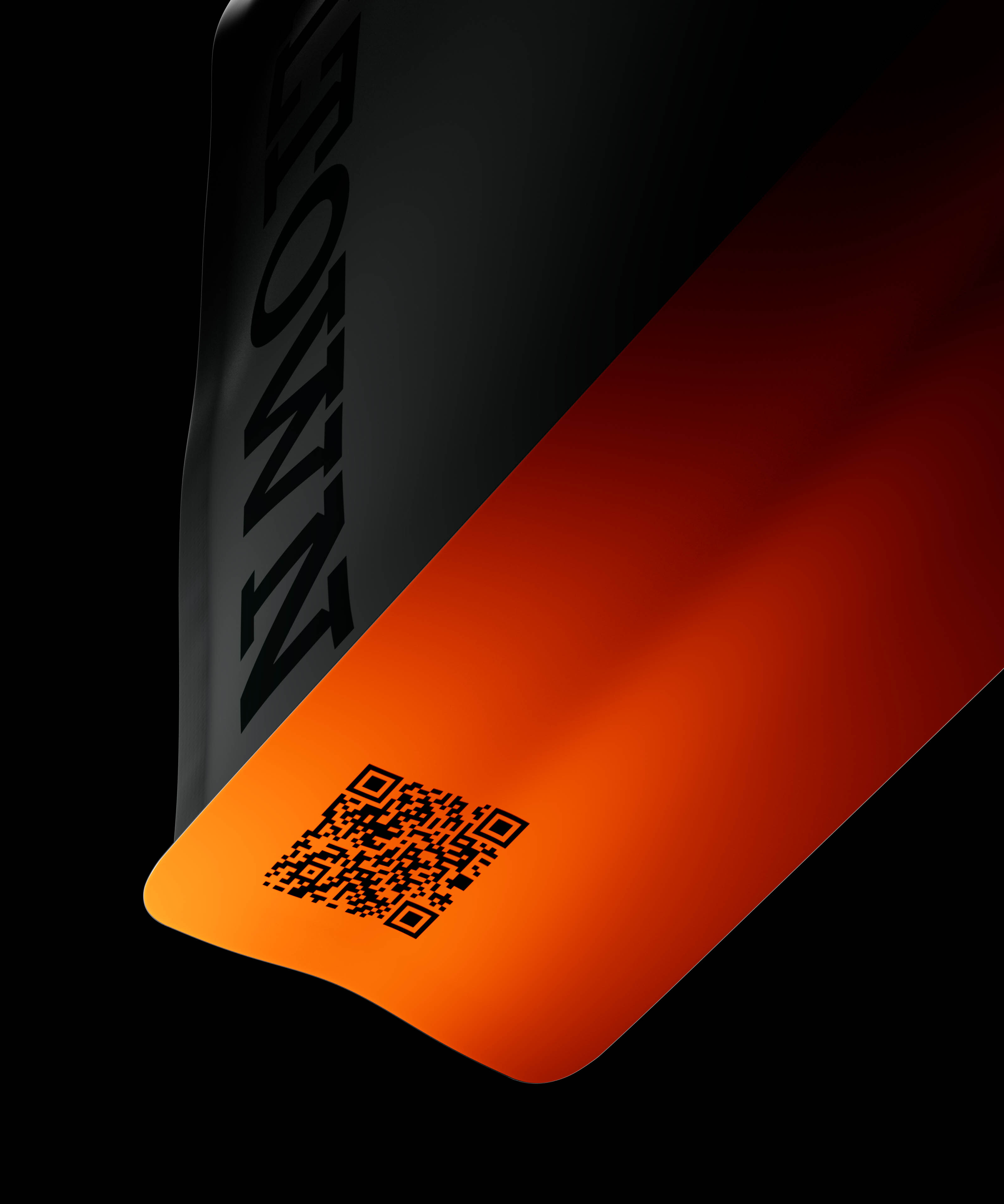 Close-up of black and orange Coaltown Coffee packaging featuring a printed QR code against a dark background.