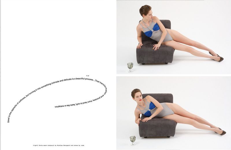 Editorial spread featuring model Greta Hofer reclining on a grey chair in a grey and blue bodysuit against a white background.