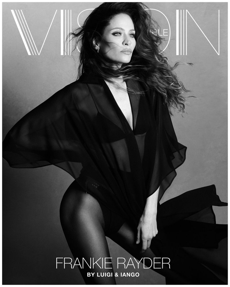 Model Frankie Rayder wearing a sheer black draped top and tights for Double Vision cover photographed by Luigi and Iango.